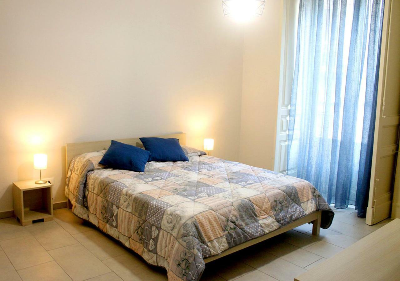 Апартаменты Sicilia Casa Vacanza Катания Экстерьер фото